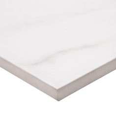 a close up view of a white marble table top