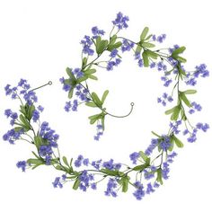 blue flowers are arranged in the shape of a circle