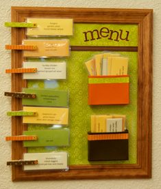 a wooden frame with several different items on it and the word menu written in spanish