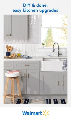 a kitchen with gray cabinets and white countertops is featured in the walmart ad