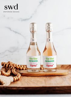 two bottles of tis the season tippy on a cutting board