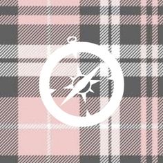 a plaid pattern with a compass in the center and an arrow on it's side