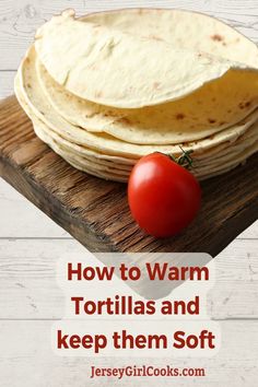 tortillas and a tomato on a cutting board with text overlay how to warm tortillas and keep them soft