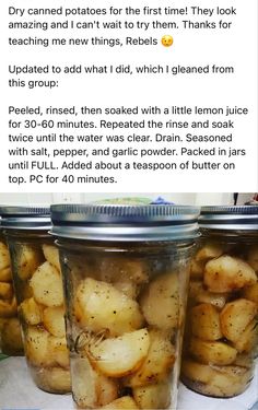 two jars filled with potatoes sitting on top of a table