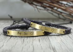 Sister Bracelets Set for 2- Big Sis , Lil Sis - This big sister and little sister set is the perfect sister gift to  show your bond to your sisters.   We can engrave "Big Sis" & "Lil Sis" as pictured and a beautiful heart symbol on the right... Or "Sisters" or "Sister" on your choice of skinny silver tag, skinny gold tag, or skinny rose tag.   If you want to make a larger sister set, for example, 3 sisters, please use this link;   https://timjeweler.com/products/3-sisters-bracelet-set-sister-jewelry-engraved-bracelet-slim-cord-braided-bracelet-sister-gift  If you want to make a sister set for 4, please choose the quantity to 2 during checkout.   This metal band was handmade from stainless steel/brass/copper sheet metal - I cut the shape, filed and sanded the edges, then shiny polish, drill Big Sister And Little Sister, Sister Bracelets, Big Sister Bracelet, Bible Verse Bracelet, Handwriting Bracelet, Paw Print Bracelet, Perfect Sisters, Bracelet Quotes, Sister Bracelet