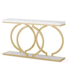 a white marble and gold metal console table