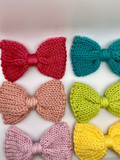 six knit bow ties in different colors