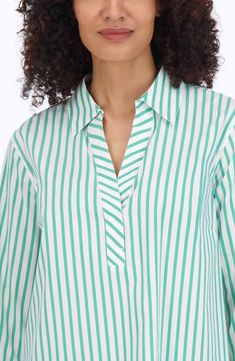 Look crisp and polished all day in this striped tunic made from a non-iron cotton blend. 25" length (size Medium) Spread collar Three-quarter sleeves 62% cotton, 33% polyester, 5% spandex Machine wash, tumble dry Imported Spring Striped Blouse With 3/4 Sleeves, Johnny Collar, Popover Shirt, Shirt Stays, Dressy Pants, Quality Fashion, Quarter Sleeve, Three Quarter Sleeves, Green Stripes