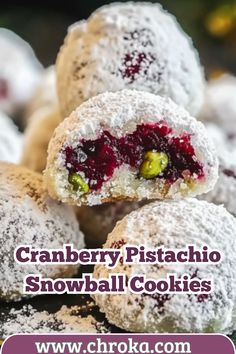 cranberry pistachio snowball cookies are stacked on top of each other