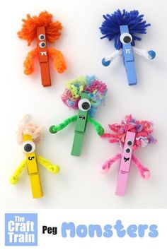 the craft train monster hair clips are made with construction paper and pom poms