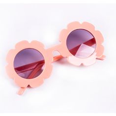 Celebrate Spring in style with these darling round wild flower sunnies! Kids Sunglasses Pack of 1 Color Options: Peach, Clear Peach, Pink, White or Clear Flower Face: 5" w x 2.5" height Playful Flower-shaped Plastic Sunglasses, Cute Flower Shaped Sunglasses With Uv Protection, Trendy Round Sunglasses For Spring, Spring Mirrored Round Sunglasses, Playful Beach Sunglasses For Spring, Spring Beach Sunglasses, Playful Sunglasses For Beach In Spring, Cute Sunglasses With Uv Protection, Cute Spring Sunglasses With Uv Protection