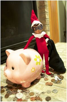 putting money in their piggy bank An Elf, Toy Puppies