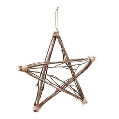 a wooden star ornament hanging from a string