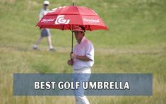 a man holding an umbrella on top of a green grass covered golf course with the words best golf umbrella