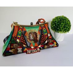 Mary Frances Handbag Good Condition No Rips Has Some Stains On The Back Please Use Pictures As They Are The Best Descriptors. Measurements: H 6 X W 12 X D 4 Came From Smoke Free Home Happy To Answer Any Questions Same Or Next Day Shipping Offer's Are Welcome Thank You Embellished Green Rectangular Shoulder Bag, Embellished Multicolor Rectangular Shoulder Bag, Multicolor Embellished Rectangular Shoulder Bag, Green Embellished Rectangular Shoulder Bag, Multicolor Embroidered Beaded Rectangular Shoulder Bag, Beaded Multicolor Embroidered Rectangular Shoulder Bag, Traditional Embellished Green Bag, Traditional Green Embellished Bag, Traditional Green Embellished Bags