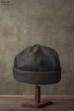 Our latest brimless hat model. Slightly more head room than the previous 'monk hat'. Padded brim. Inside using the softest rayon ribbon. Lined with camouflage cotton. Made from wool cashmere. This is the deepest black that is not shiny that we can source. Two sizes. Made in new York. Hat Model, Brimless Hat, Watch Cap, Camouflage, Cashmere, Ribbon, Wool, Hats, Black