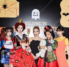 the girls are posing with their halloween costumes