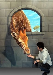 a man kneeling down in front of a painting of a giraffe