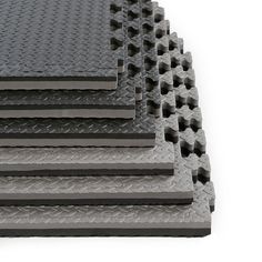 several different types of rubber mats stacked on top of each other