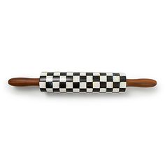 a black and white checkered rolling pin