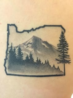 a black and white photo of the state of oregon with trees on it's back