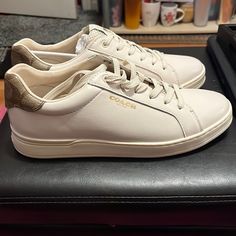 Authentic Coach Sneaker Size 8 1/2 (Runs A Little Big) Color: Khaki/Brown/Chalk Never Worn Brand New No Box Coach Beige Sneakers With Round Toe, Coach Beige Round Toe Sneakers, Khaki Sneakers, Shoes Low Top, Coach Sneakers, Coach Shoes, Color Khaki, Womens Shoes Sneakers, Low Top