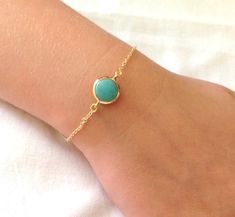 Natural Turquoise Bracelet, Gold Plated Bracelet, Blue Jewelry, Fashion Jewelry, Modern, Stylish, Natural Stone,Beach Accessory, Summer Jewelry Natural Turquoise bead surrounded with gold material which is nonturnish.. Perfect to wear it with jeans in casual times.I like this piece. It can be worn as an ankle bracelet,it is your choise. It is 7 inches long (adjustable upon request) I appreciate your taking the time to look at my items. Thank you. Happy Shopping! Dainty Turquoise Bracelets For Beach, Dainty Turquoise Bracelet For Beach, Turquoise Bracelet Gold, Stone Beach, Multi Chain Bracelet, Gold Plated Bracelet, Casual Jewelry, Bohemian Bracelets, Bracelet Blue