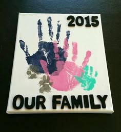 a handprinted sign that says, 2013 our family