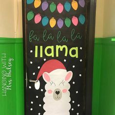 a door decorated with a llama wearing a santa hat