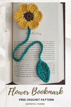 an open book with crochet flowers on it and the title flower bookmark free crochet pattern