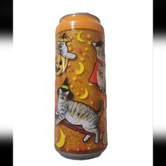 an orange can with cats on it