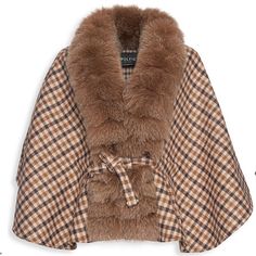 Wolfie Fur Harper Fox Front Cashmere Blend Cape Brown Beige One Size Fits All $1,200. New Without Tags. A Tonal Fox Fur Trim Around The Neckline Gives This Plaid Cape A Luxurious Look. V-Neck Front Tie Cashmere/Wool Fur Type: Dyed Fox Fur Origin: Finland Dry Clean By Fur Specialist Made In Italy Size & Fit About 24" From Shoulder To Hem Fall Cape Fur Coat With Faux Fur Trim, Fur Lined Cape, Luxury Brown Winter Cape, Coats 2023, Cape Sweater Ponchos, Cozy Brown Cape-style Outerwear, Black Cape Coat, Plaid Capes, Luxury Brown Mink Fur Outerwear