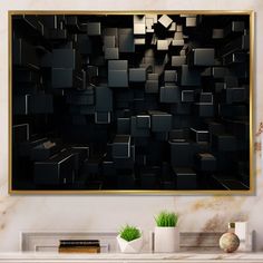 an abstract black and gold wall hanging over a fireplace