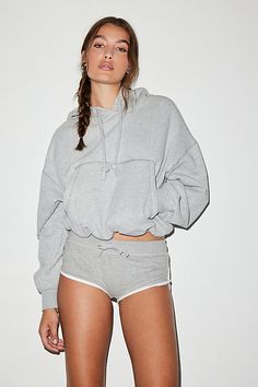 Updated Out From Under pullover hoodie in a boxy & cropped fit. Designed in a super-soft brushed knit featuring a crew neckline with hood & string details, front kanga pockets and a cinched bubble hem designed to be an elevated everyday basic. Exclusively at Urban Outfitters. Features Out From Under Try Me bubble hoodie sweatshirt Cropped pullover sweatshirt Soft & stretch brushed knit Crew neckline with hood & string details Drop shoulder long sleeves Front kanga pocket Cinched bubble hem Boxy, Women Men Shoes, Popular Style, Pullover Sweatshirt, Pullover Hoodie, Urban Outfitters, Fitness Models, Fashion Forward, Lounge Wear, Relaxed Fit