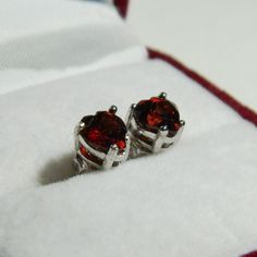 GARNET - Warm Red Garnet .9 ct each Heart - Sterling Silver Stud Earrings - pair Rich Warm Red Garnet Hearts - .9 ct each - 6 x 6 mm - VS Clarity -  superior luster - untreated stones. These stones have been tested for authenticity. .925 Sterling Silver - basket-style 4 prong stud earring settings with butterfly push back closure. Garnet is the January Birthstone. Please read the FAQ's for more information. Silver Basket, Garnet Heart, Basket Style, Warm Red, Sterling Silver Stud Earrings, January Birthstone, Silver Stud Earrings, Red Garnet, Sterling Silver Studs