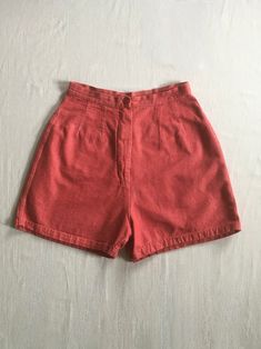 1950s pre-shrunk cotton shorts soft red w/white undertone double seams down front zip fly, button top white stitching 1 right back pocket w/decorative cross seams good vintage condition, light wear ink marks- back right near hem measures, lying flat, waist-12 1/4" to 12 1/2" pulled taught (24 1/2" to 25" total) rise-14" inseam-3" hem-11" hip-20 1/2" outseam-15 1/2"     We do not offer returns or refunds unless something is grossly misrepresented. Please contact us within 2 business days of recei 1950s Shorts Outfit, Fitted High Waist Cotton Jean Shorts, Fitted High-waist Cotton Jean Shorts, Fitted Cotton Shorts With Pockets, Solid High Waist Cotton Jean Shorts, High Waist Cotton Jean Shorts, Fitted Cotton Jean Shorts With Pockets, Retro High Rise Cotton Shorts, Retro High Waist Cotton Shorts