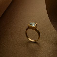 A new addition to our Aegis collection.. Hand-carved in wax before being cast in 18ct yellow gold, we choose this gorgeous 1.71ct aquamarine for its vivid blue colour and geometric shape. #aquamarine #newcollection #aegisring #designmaker #craftsmanship #bespokejewellery #london #dublin #jewellerydesign #aquamarinering #waxcarving #aegis #sculpturaljewellery Wax Carving, Design Maker, Aquamarine Rings, Blue Colour, Aquamarine, Geometric Shapes, Hand Carved