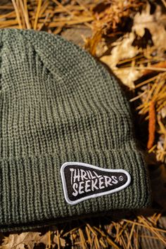 Ahoy, Matey! Here's a knitted fisherman style cuffed beanie in a sweet Cypress Green color with our 'Ahoy' patch sewn into the wearers' front left side. Details Low Profile Fit Wide Ribbed Knit Fisherman Style Mid weight One Size Fits All Materials 100% Acrylic Knit Beanie Cap For Outdoor, Knitted Cotton Hats For Streetwear, Fall Cotton Knitted Beanie, Cotton Knitted Hats For Streetwear, Cotton Beanie For Cold Weather In Fall, Outdoor Cotton Knitted Hat, Outdoor Cotton Beanie Cap, Casual Knitted Beanie For Streetwear, Fitted Cotton Casual Beanie