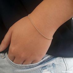 Whether worn as a friendship bracelet, solitary or worn in combination with different bracelets, it provides you with subtle bling. The 1mm 14k gold filled chain is delicate and very fine, it is closed with a spring clasp and has an extension of 1.5 inches. Great for summer is a combination with other fine bracelets of My Jooli's (see pic. 5) ✤Material: 14k GOLD FILLED chain and clasps ✤Total length: 6//6.5//7//7.5//8 inches with an extension of 1.5 inches ✤If you need a different size please se Tiny Sterling Silver Minimalist Bracelet, Dainty Chain Bracelet For Friendship, Minimalist Gold Jubilee Bracelet For Friendship, Minimalist Delicate Chain Jewelry For Friendship, Dainty White Gold Chain Bracelet For Everyday, Minimalist White Gold Bracelet For Everyday, Everyday Dainty White Gold Chain Bracelet, Minimalist 14k Gold Jewelry For Friendship, Minimalist White Gold Delicate Chain Bracelet