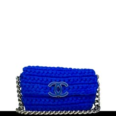 Chanel blue braided fabric crochet flap with large CC logo clasp closure and thick chain Year: 2014 Silver hardware Interior zipper pocket Interior blue canvas lining Strap drop 11” 6” H x 10” W x 2” D Made in Italy Bags Classy, Expensive Life, Aesthetic Chanel, Chanel Classic Flap Bag, Braided Fabric, Elevated Fashion, Chanel Blue, Fabric Crochet, Basket Sport