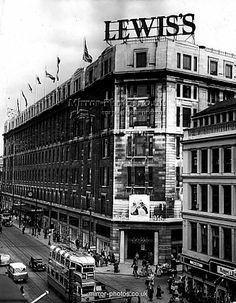 an old black and white photo of the lewis building