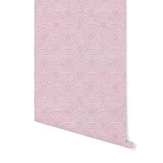 a pink wallpaper with an art deco style pattern on the front and back of it