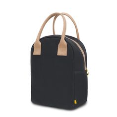 a black lunch bag with tan handles