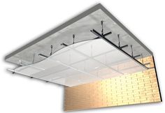 an overhead view of a brick wall and ceiling with metal brackets on the side,