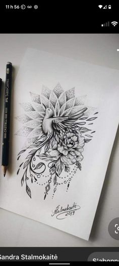 a black and white drawing of a bird with flowers on it's head next to two markers