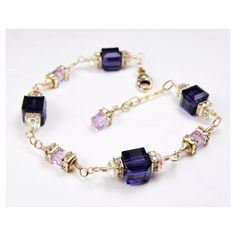 Luscious dark purple Swarovski crystal bracelet is handmade with gorgeous large deep purple Swarovski crystal cubes and small lavender Swarovski crystal cube accents. Bright and clear Swarovski crystal rhinestone crowns add sparkle to this elegant modern bracelet.  A gorgeous bracelet gift for a woman who loves purple hues and sparkly jewelry. Dressy bracelet perfect for weddings: maid of honor, mother of the bride or mother of the groom thank you gifts. Bracelet Details: - Bracelet length is 7 Modern Purple Wedding, Modern Wedding Jewelry, Purple Wedding Jewelry, Violet Crystal, Modern Bracelet, Bridal Party Jewelry, Modern Bracelets, Purple Bracelet, Rhinestone Crown