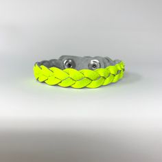 Handcrafted, hand-braided genuine leather bracelet. Leather texture is soft and smooth on your skin. Two size adjustable snaps. They look great alone or stacked! *Bracelet sizing- Fits wrists as small as 5.5” and as large as 7.5”. Buttercup Yellow, Fluorescent Yellow, Genuine Leather Bracelet, Bracelet Leather, Braided Bracelet, Leather Texture, Your Skin, Leather Bracelet, Cufflinks