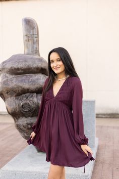 This pretty, three-tiered maroon dress is perfect for Graduation, Ring Day, or any Aggie event! It features a cute tie up on the back of the dress and a deep v-neck in the front
Brand: Mustard Seed
Shell: 100% Polyester / Lining: 100% Rayon
Hand Wash Cold 
Do Not Bleach 
Do Not Iron Ruched Long Sleeve Dress, Graduation Ring, Ls Dress, Deep Maroon, Mustard Seed