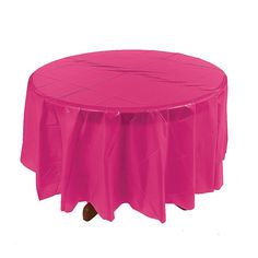 a round table covered in pink plastic