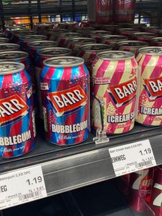 several cans of barr ice cream are on display